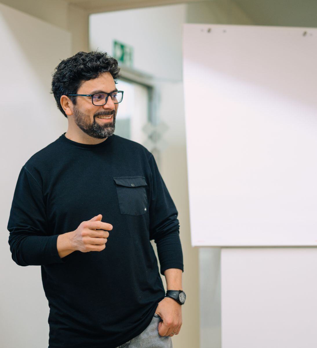 Man standing in front of a whiteboard | CRM Integration with SUNZINET