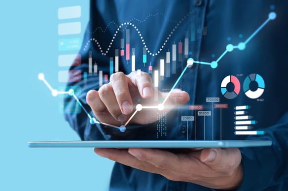Tablet with different graphs | Header image for AI in CRM